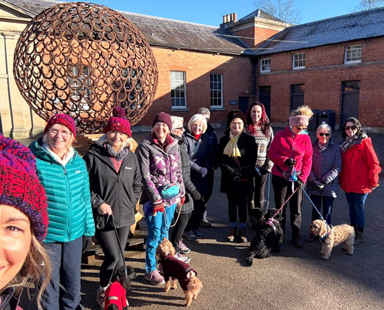 Several ladies get ready for a winter walk